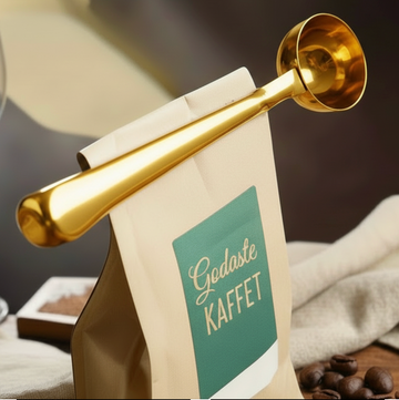 Kaffemått och förslutning i ett - guld